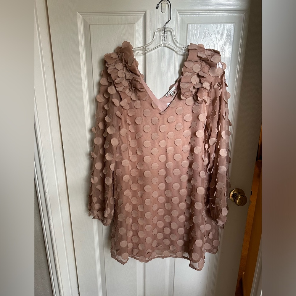 Brand new long sleeved dot dress